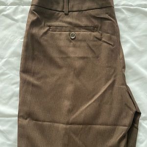 Women’s dress pants size 4. Brown color with a faint stripe throughout.